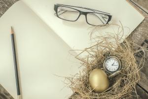 advice book with glasses, pencil and egg basket